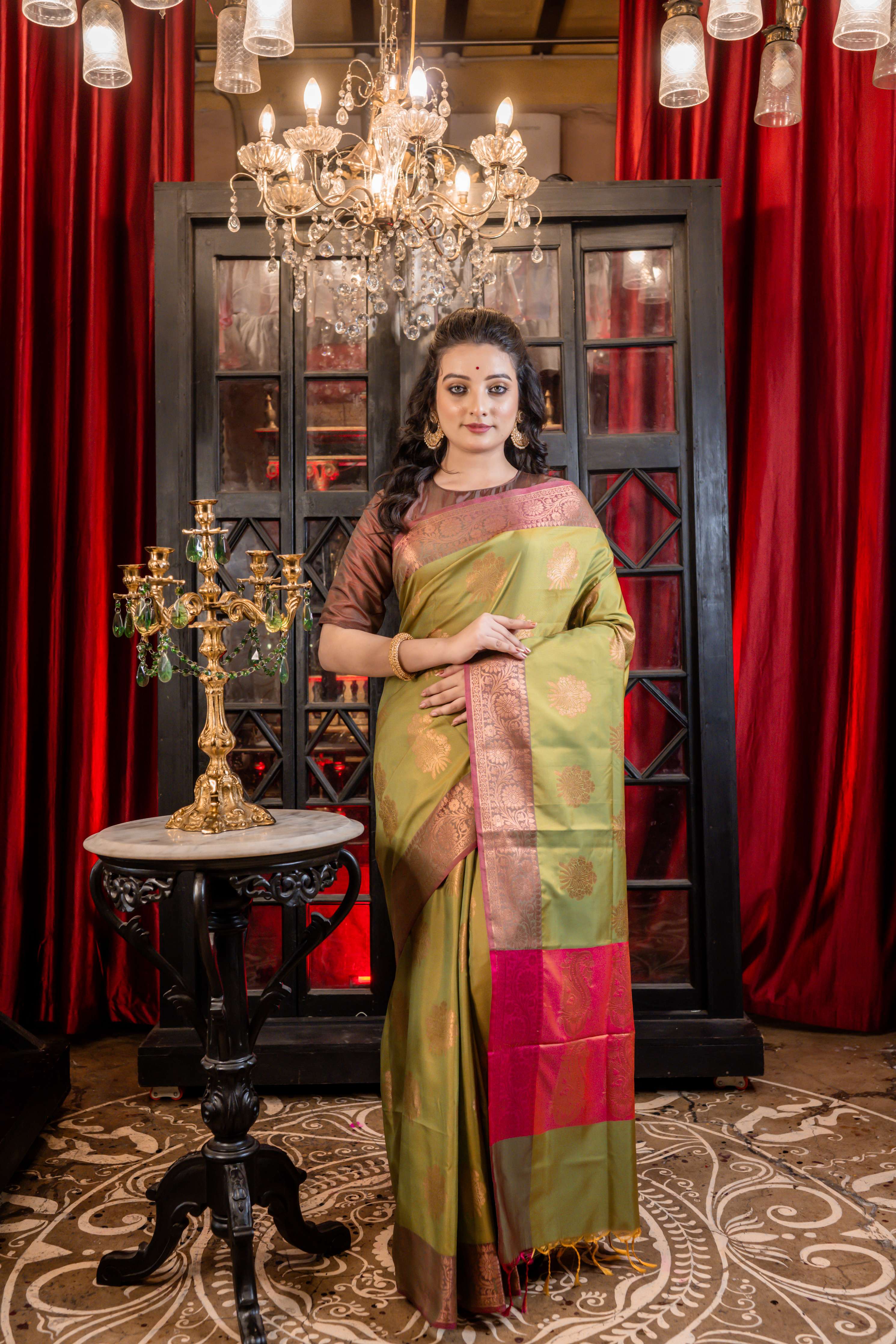 Shevanti || Sap Green & Mustard Yellow dual tone Soft Katan Banarasi Saree with all over Copper Zari Floral buta and border