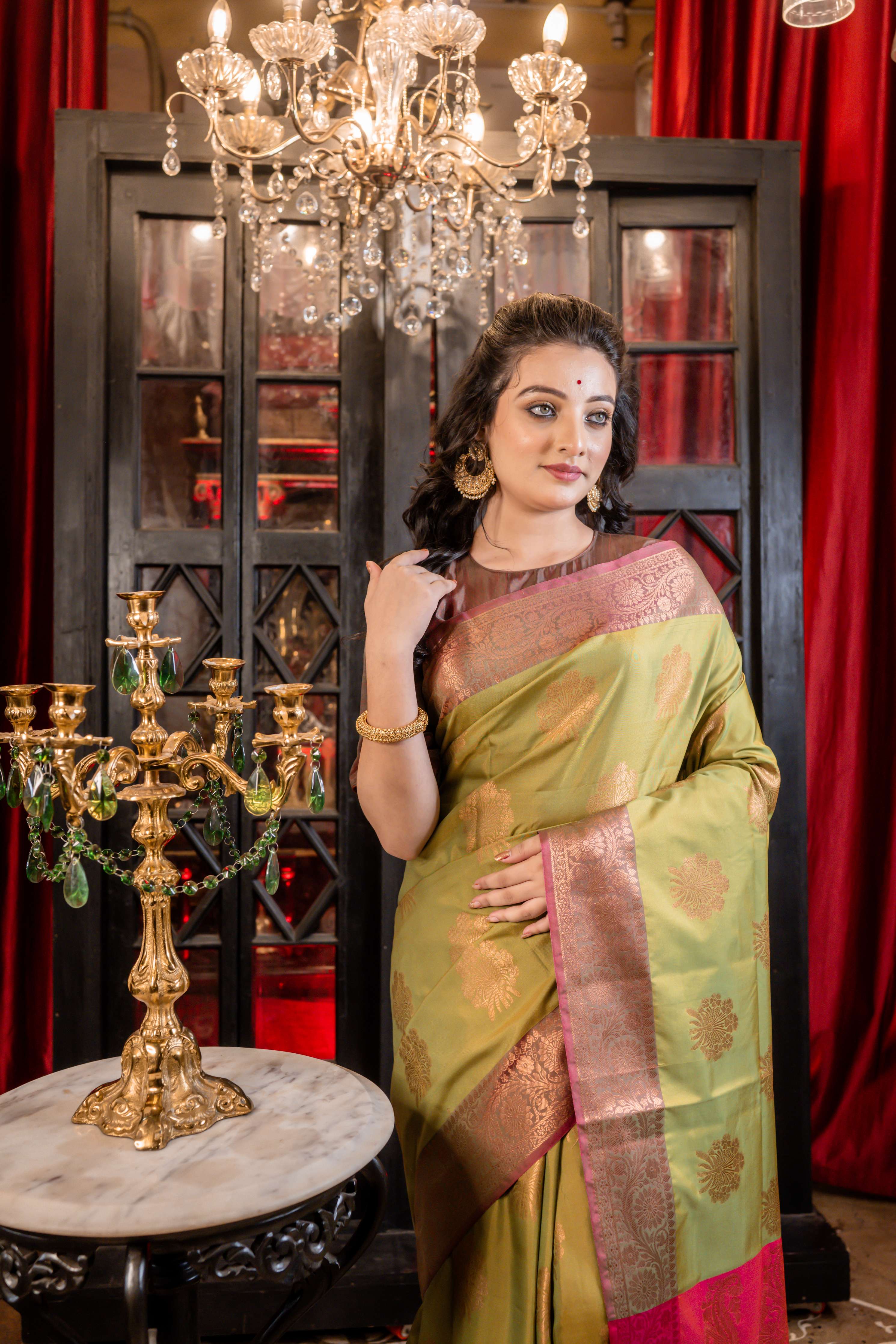 Shevanti || Sap Green & Mustard Yellow dual tone Soft Katan Banarasi Saree with all over Copper Zari Floral buta and border