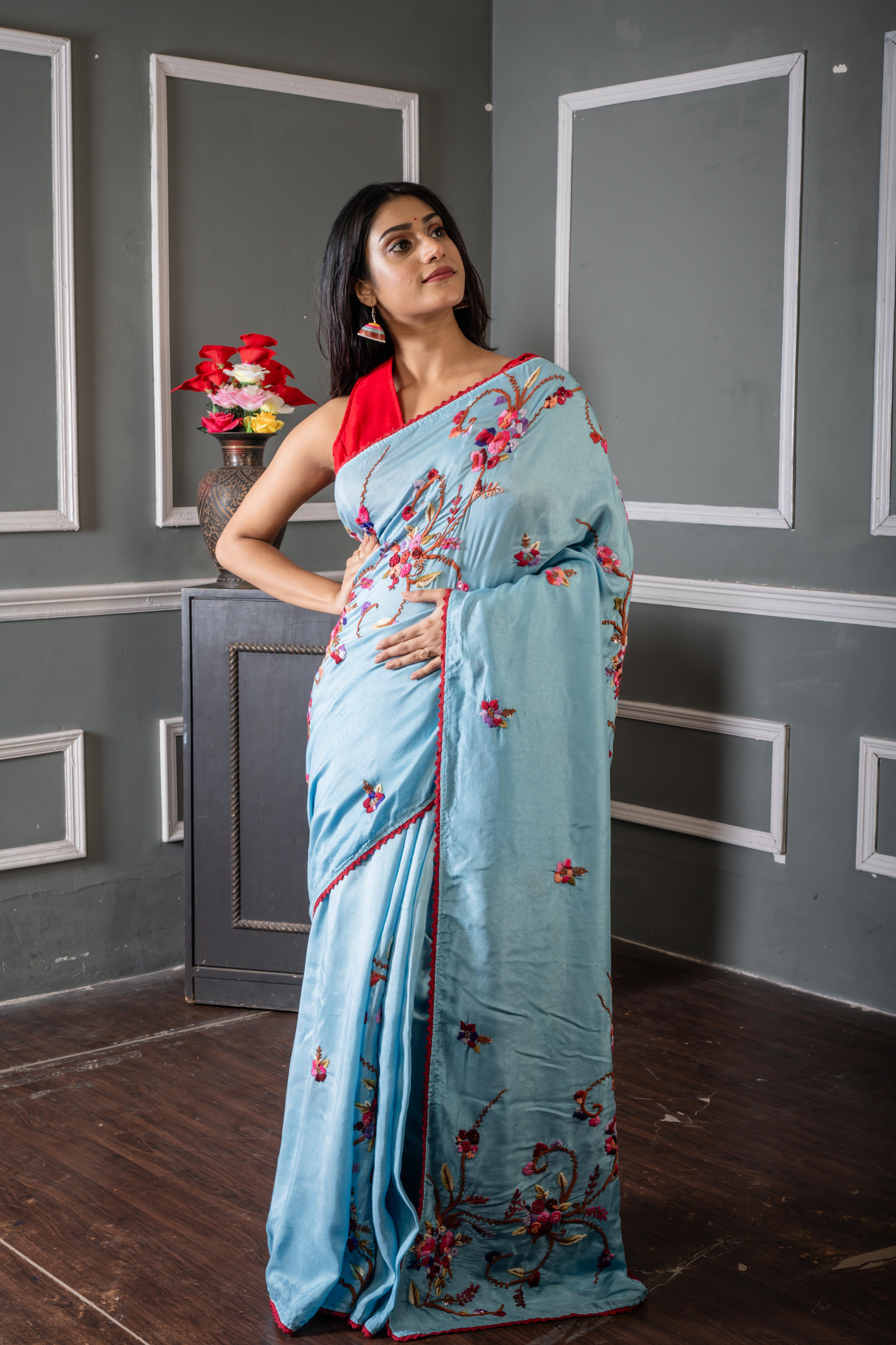Roya || Sky Blue Russian Silk Hand Embroidery Saree with all over Multi-colour Resham Boolean Parsi Floral motif and Sequins Highlights