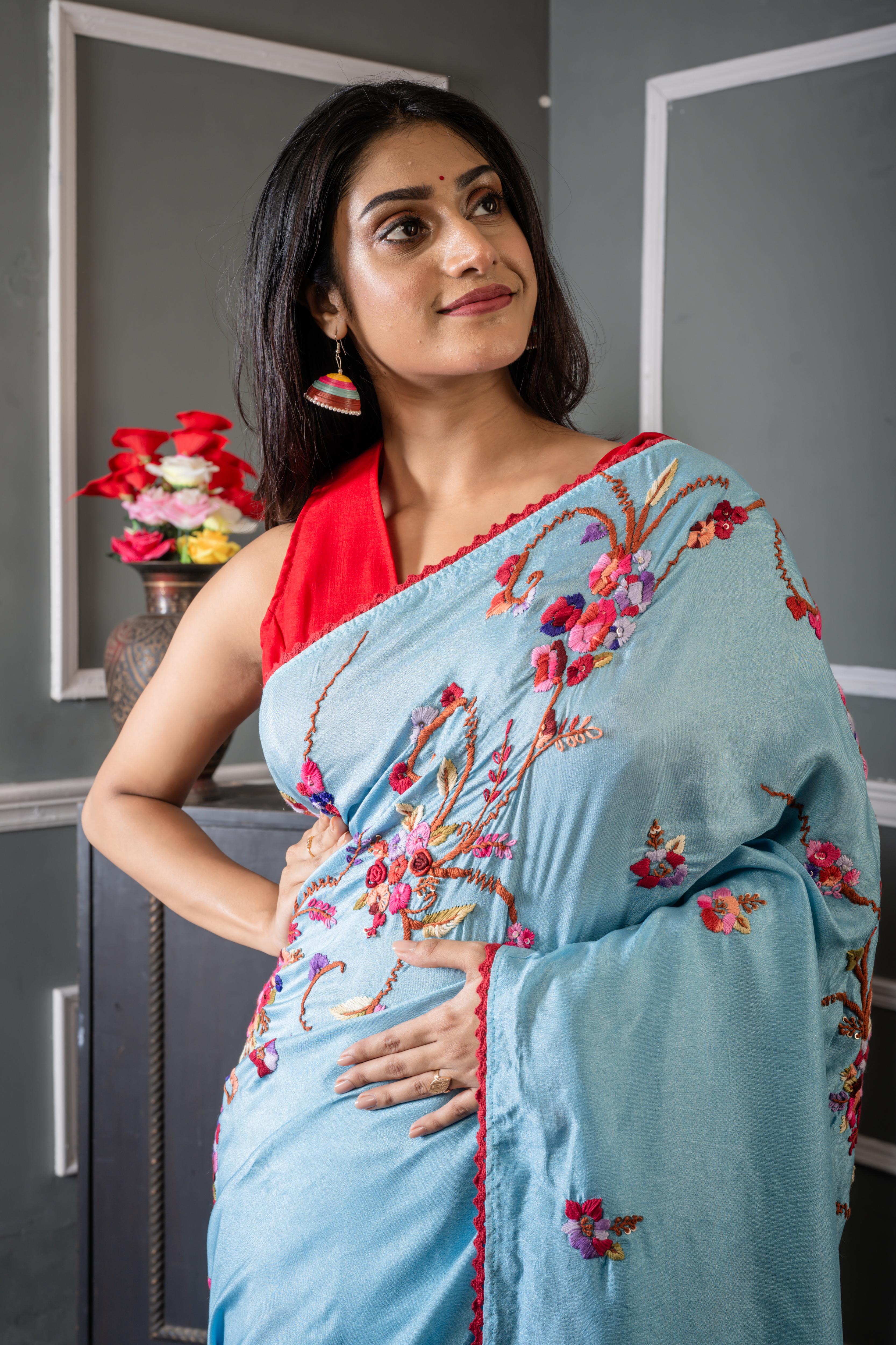 Roya || Sky Blue Russian Silk Hand Embroidery Saree with all over Multi-colour Resham Boolean Parsi Floral motif and Sequins Highlights