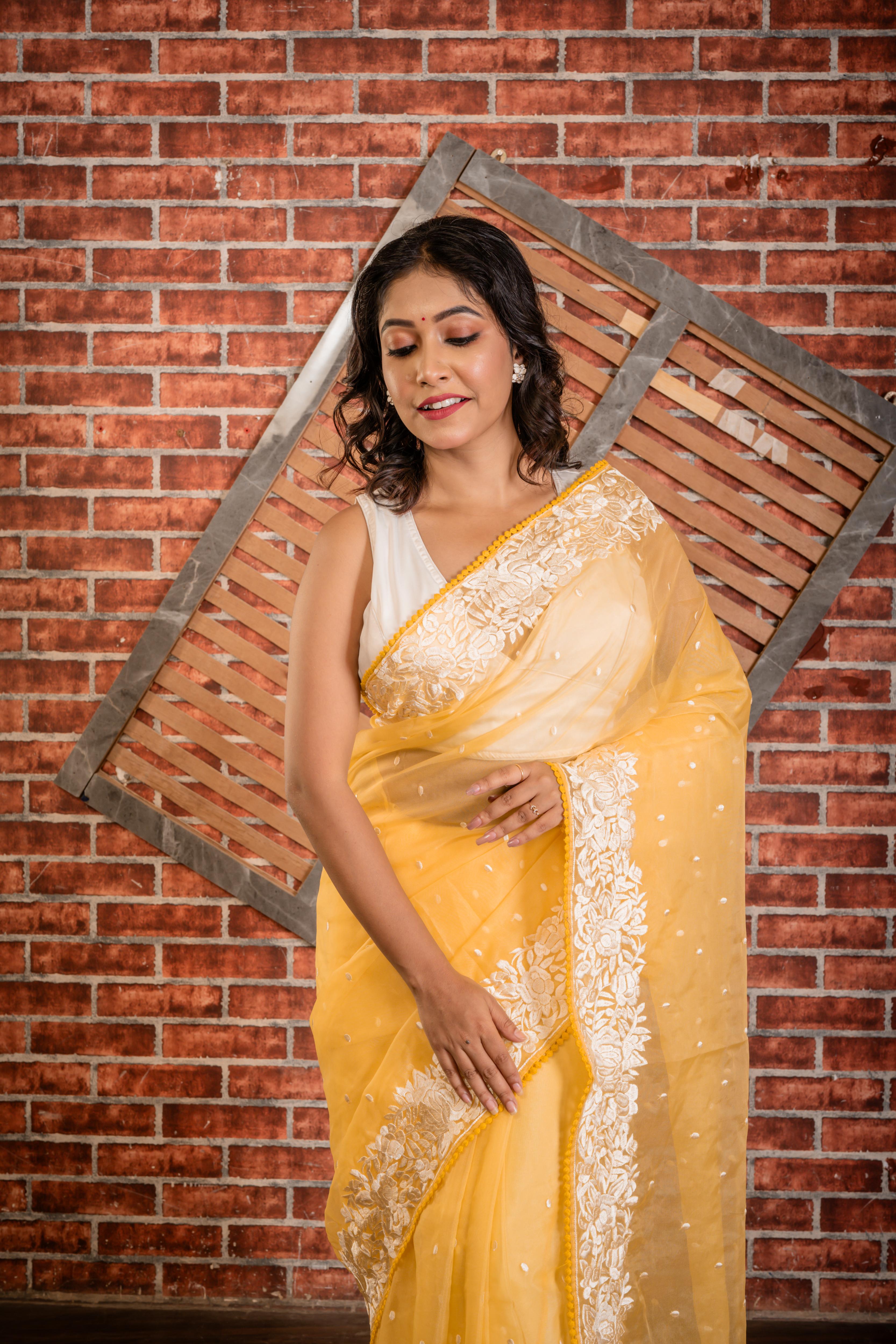 Pushpita || Yellow Soft Organza Saree with all over White Resham Buti and Parsi Gara Embroidery Border