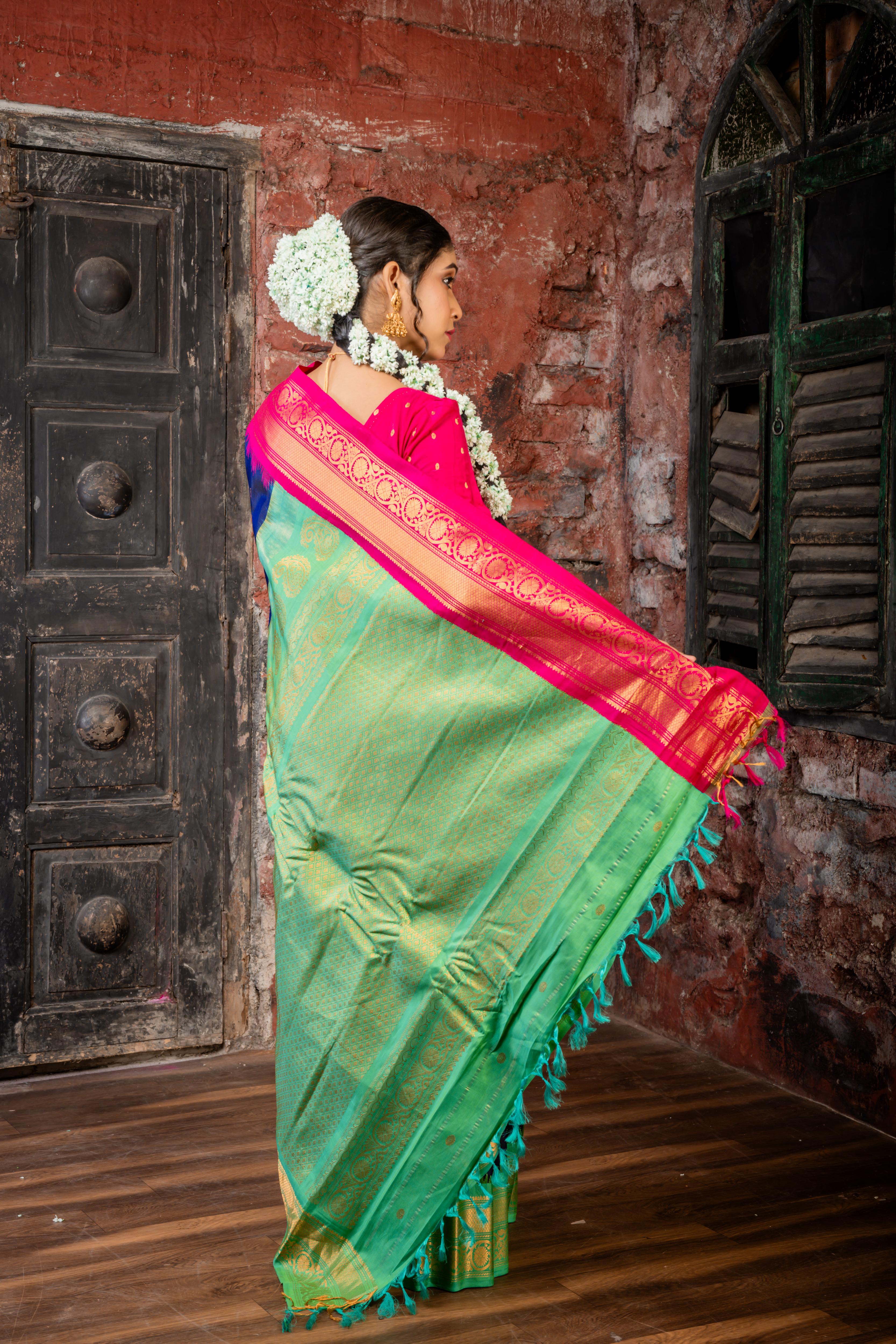 Meenakshi || Violet Pure Gadwal Silk Handloom Saree with all over Antique Gold Buti, Magenta & Parrot Green 'Temple' & Antique Gold Zari 'Ganga-Jamuna' Border and Parrot Green Pallu in Traditional Golden Zari design