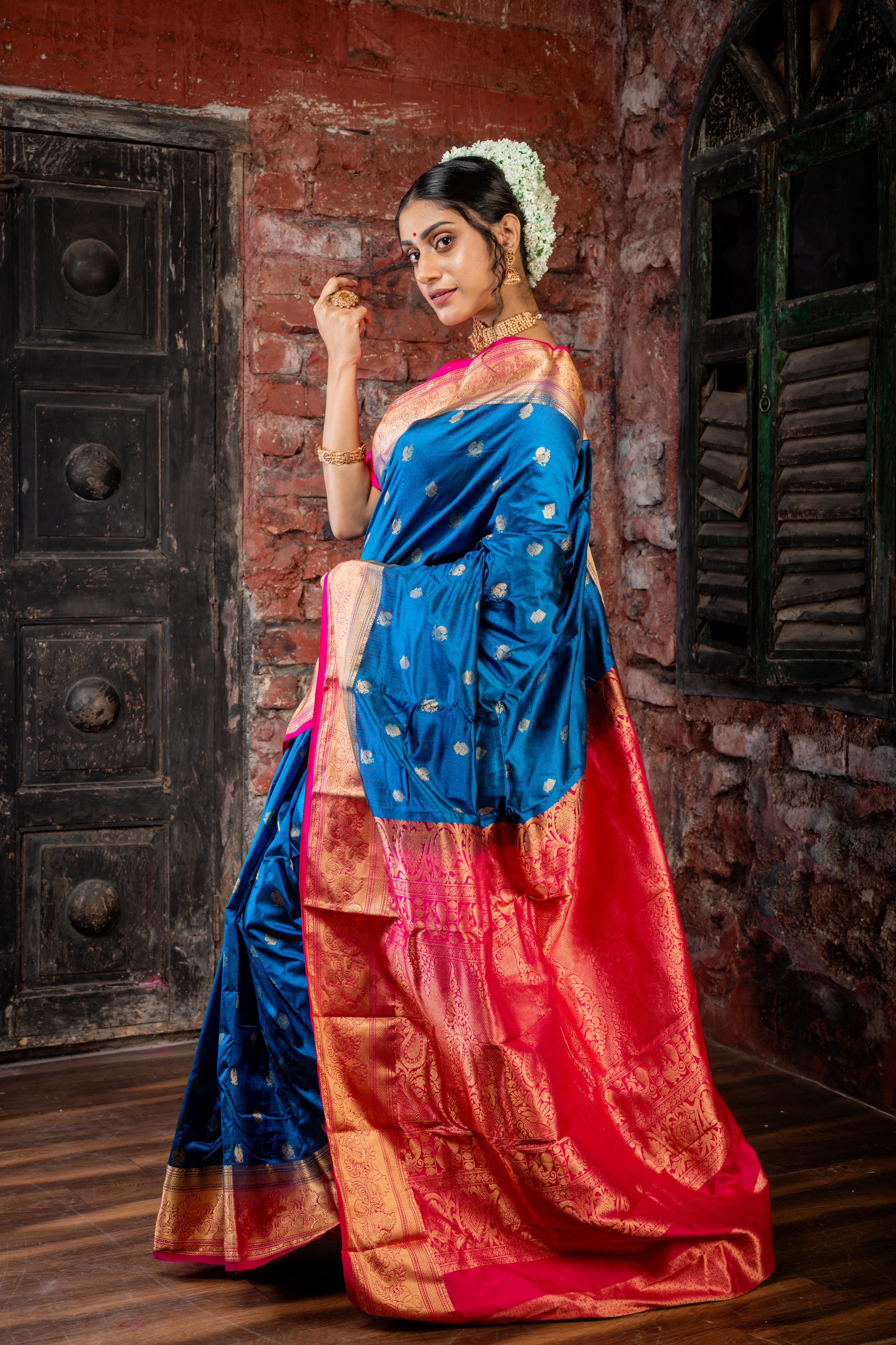Mayura || Peacock Blue Pure Kanjivaram Silk Handloom Saree with all over Golden Zari 'Peacock' motif Buta, Magenta broad & Golden Zari Border and traditional design Pallu