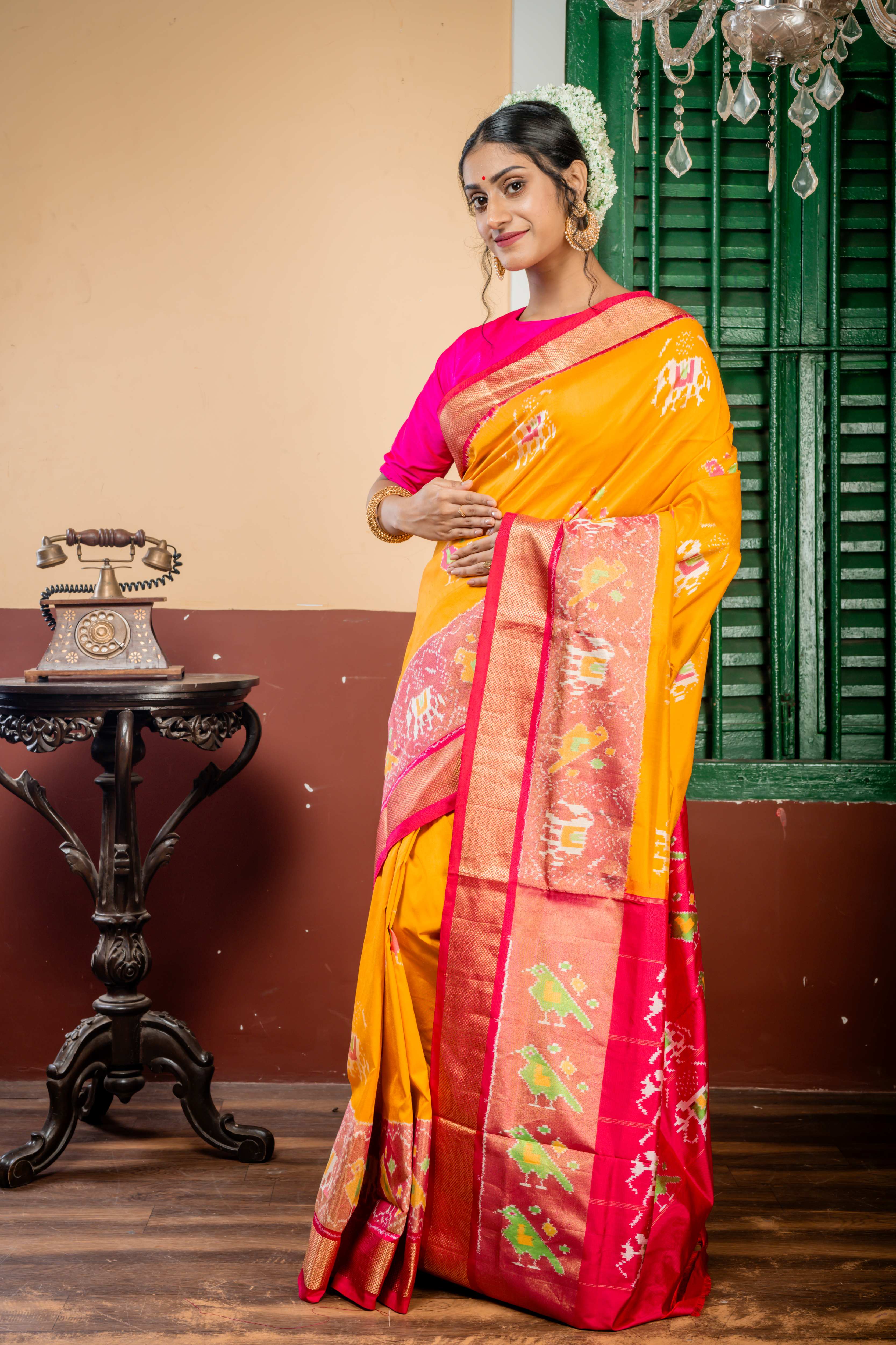 Revathi || Golden Yellow Pure Silk Ikkat Handloom Saree with all over Multi-colour 'Elephant' & 'Bird' motif and Magenta-Red dual tone & Antique Zari Ikkat Border & Pallu