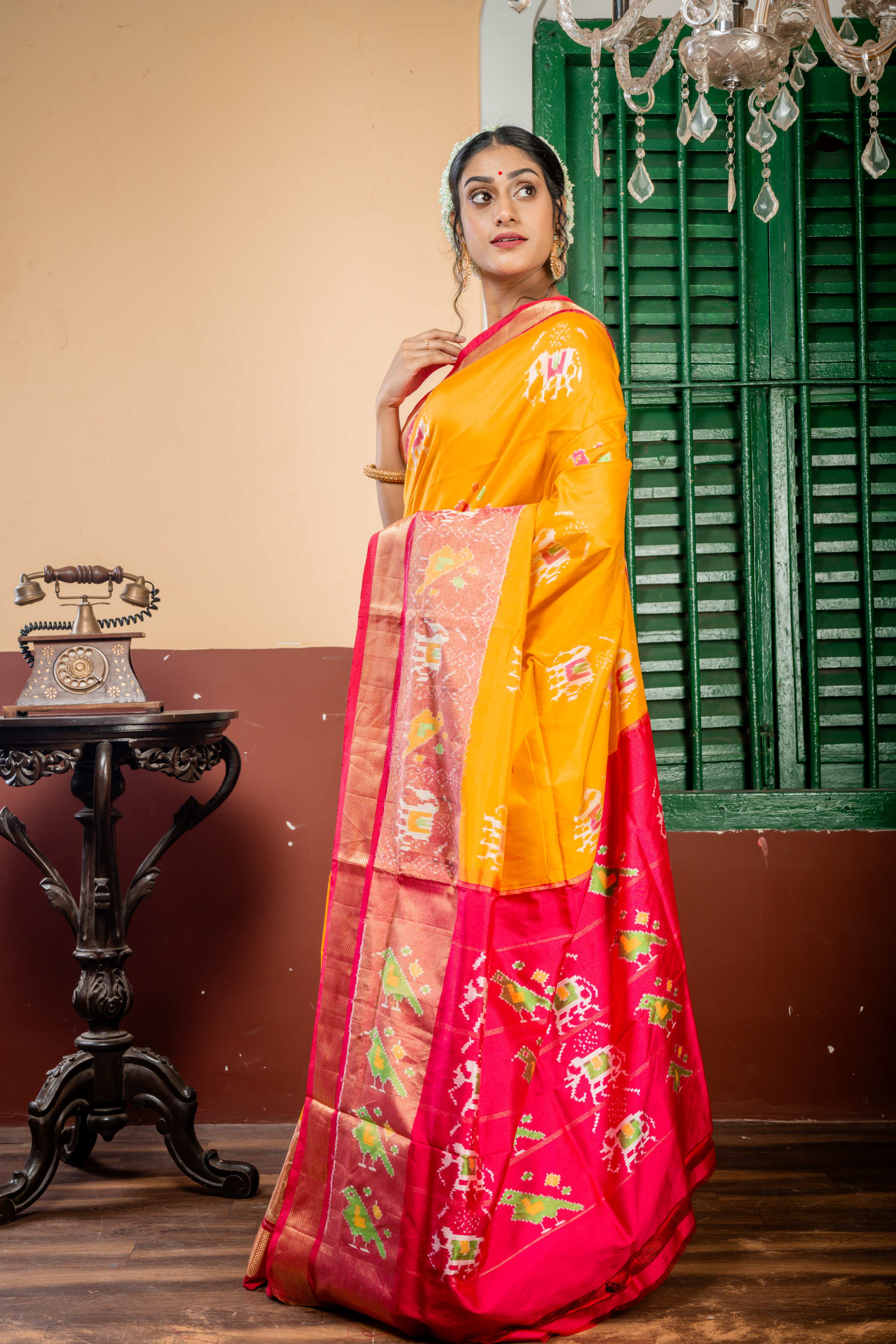 Revathi || Golden Yellow Pure Silk Ikkat Handloom Saree with all over Multi-colour 'Elephant' & 'Bird' motif and Magenta-Red dual tone & Antique Zari Ikkat Border & Pallu