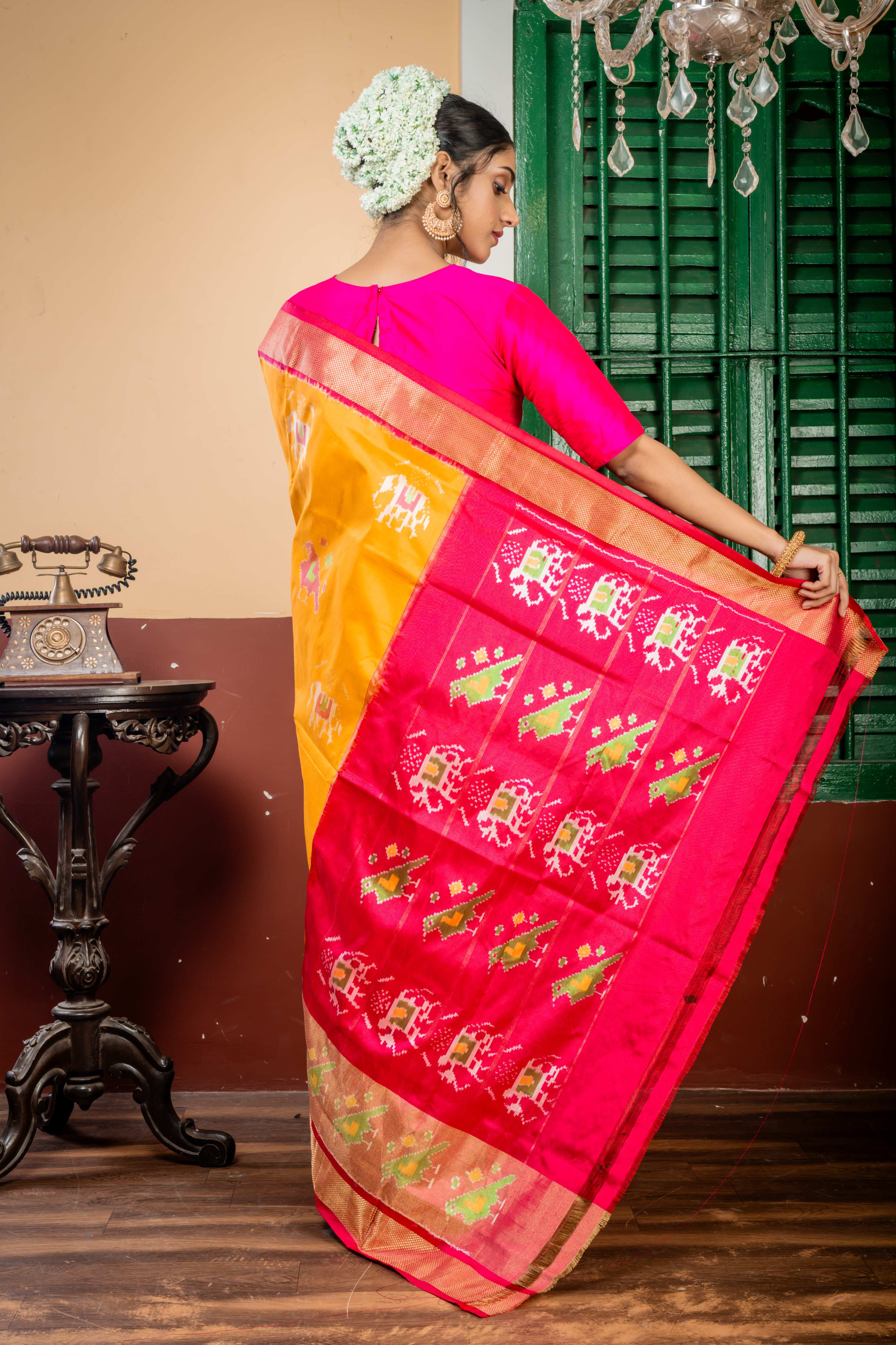 Revathi || Golden Yellow Pure Silk Ikkat Handloom Saree with all over Multi-colour 'Elephant' & 'Bird' motif and Magenta-Red dual tone & Antique Zari Ikkat Border & Pallu