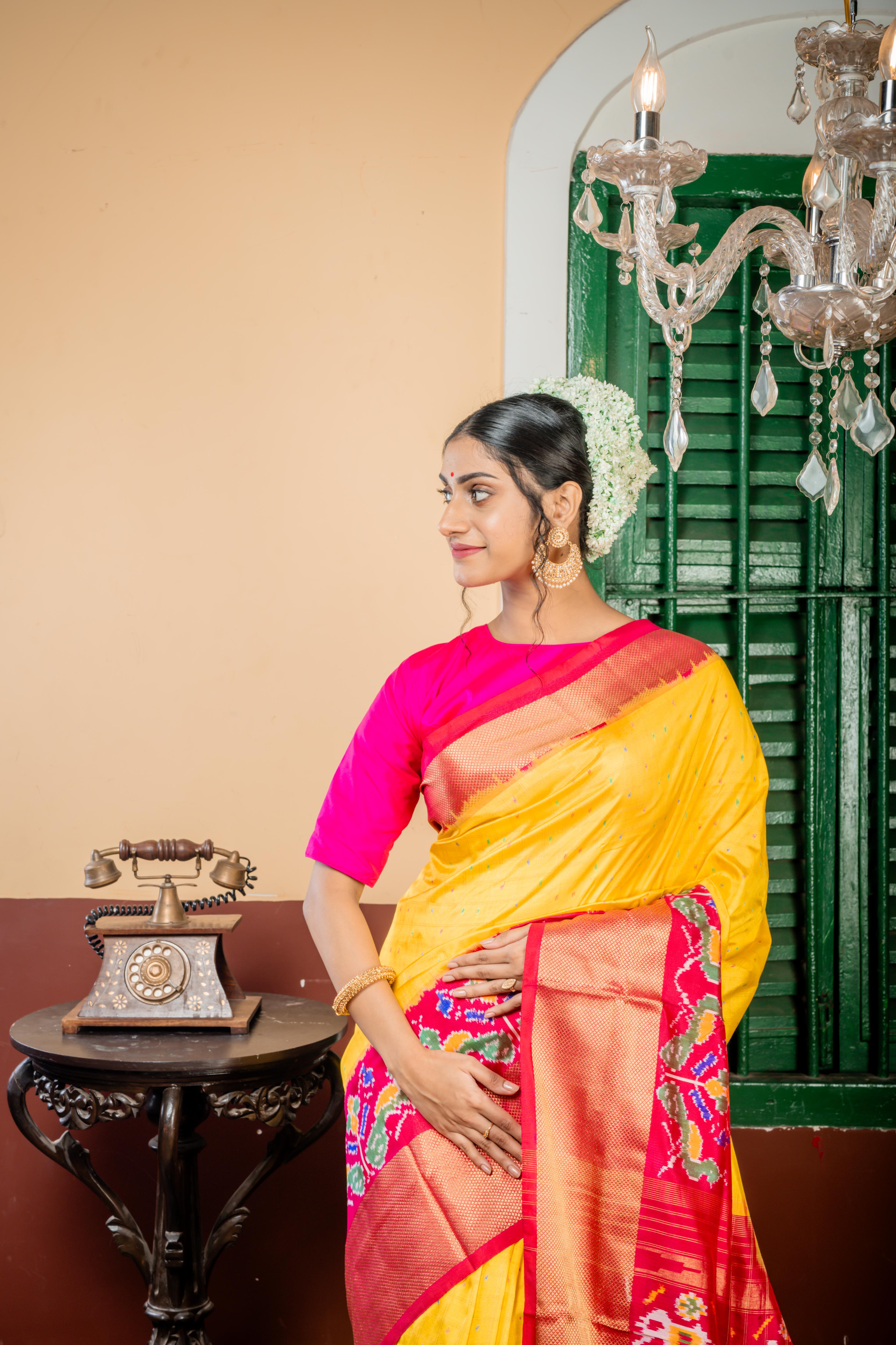 Gajagamini || Bright Yellow Pure Silk Pochampally Handloom Saree with all over Multi-colour Ikkat Buti & Matte Gold Zari Checks, Magenta Pink & Red dual tone with Antique Gold Zari Ikkat Border & Pallu with Zari Checks highlights