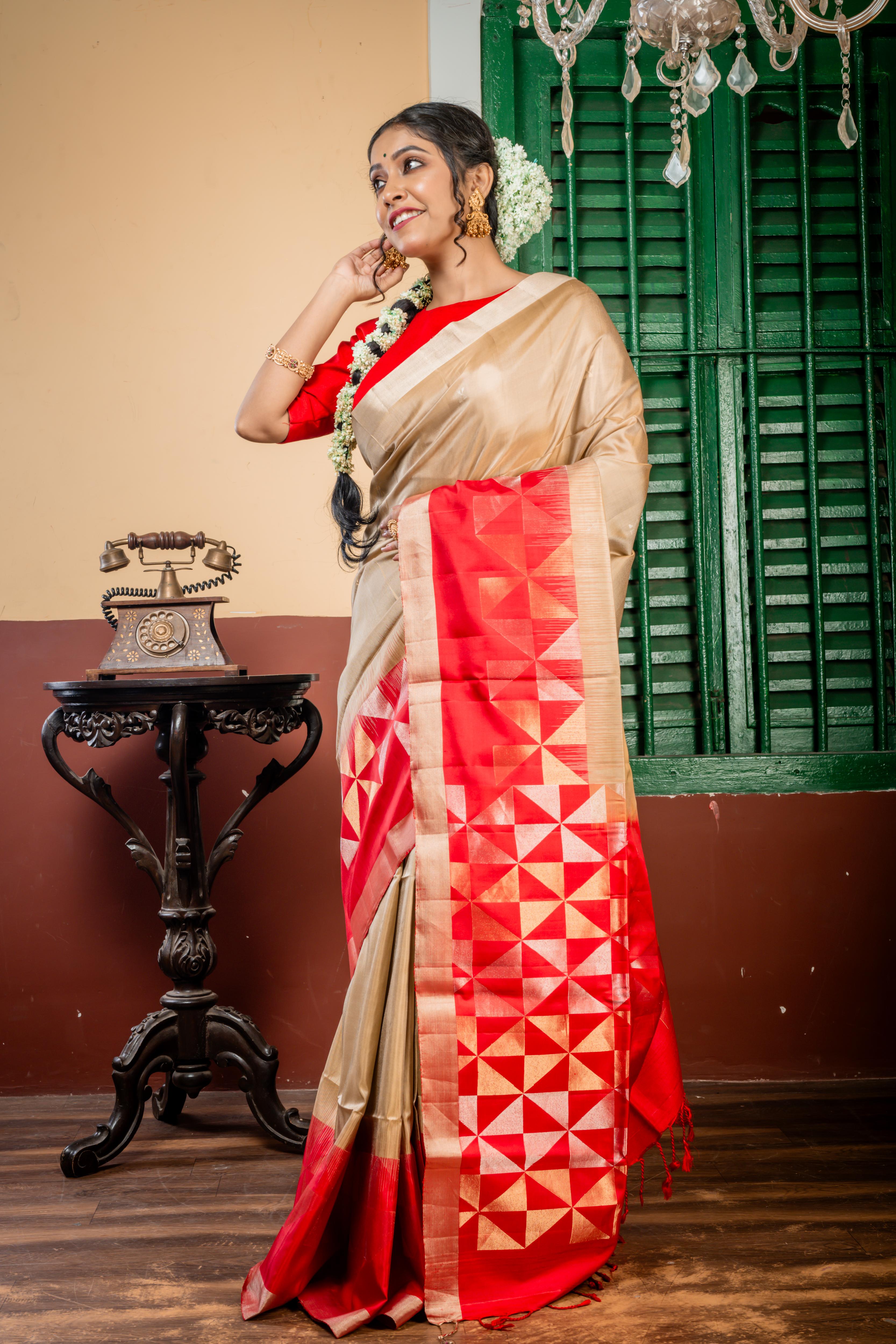 Ranjitha || Beige Gold Pattu Soft Silk Handloom Saree with all over Matte Gold & Matte Silver Zari Abstract Buta, Plain Copper Border and Red Border & Pallu in Antique Gold & Antique Silver Zari Abstract Triangle design