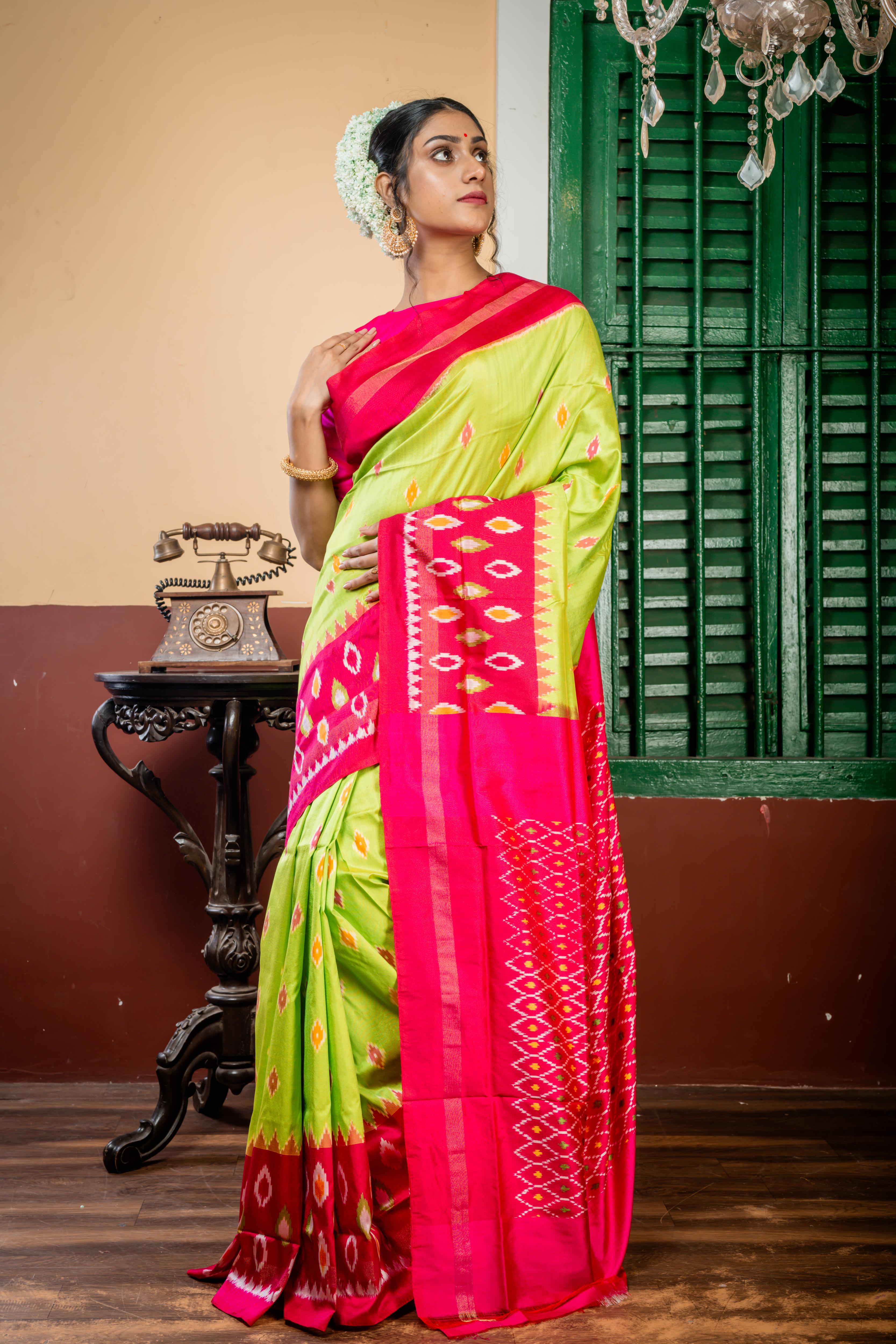 Tulasi || Parrot Green Pure Silk Ikkat Handloom Saree with all over Multi-colour traditional Ikkat Buta, Magenta & Antique Zari Border and all over Ikkat Pallu