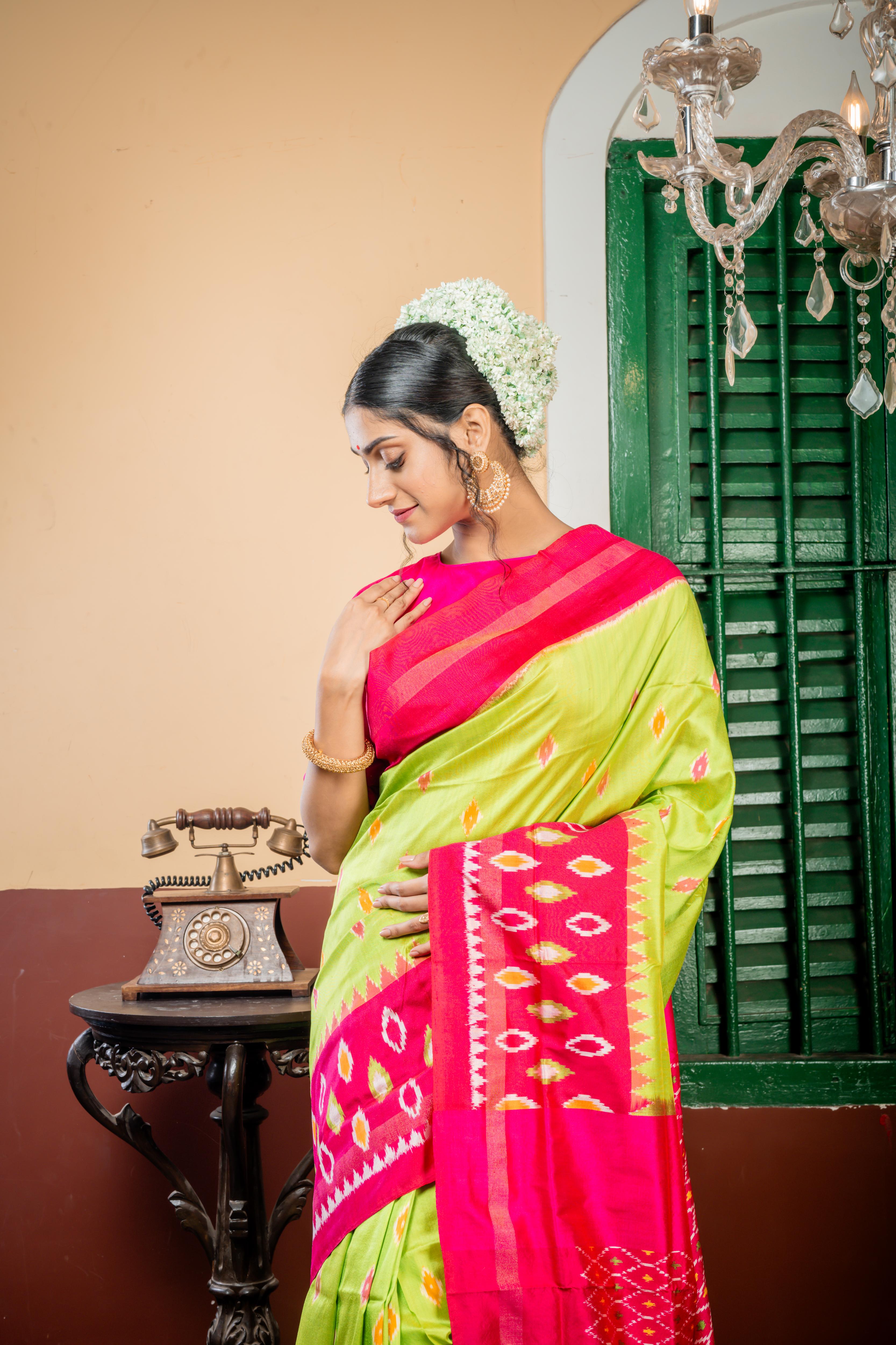 Tulasi || Parrot Green Pure Silk Ikkat Handloom Saree with all over Multi-colour traditional Ikkat Buta, Magenta & Antique Zari Border and all over Ikkat Pallu