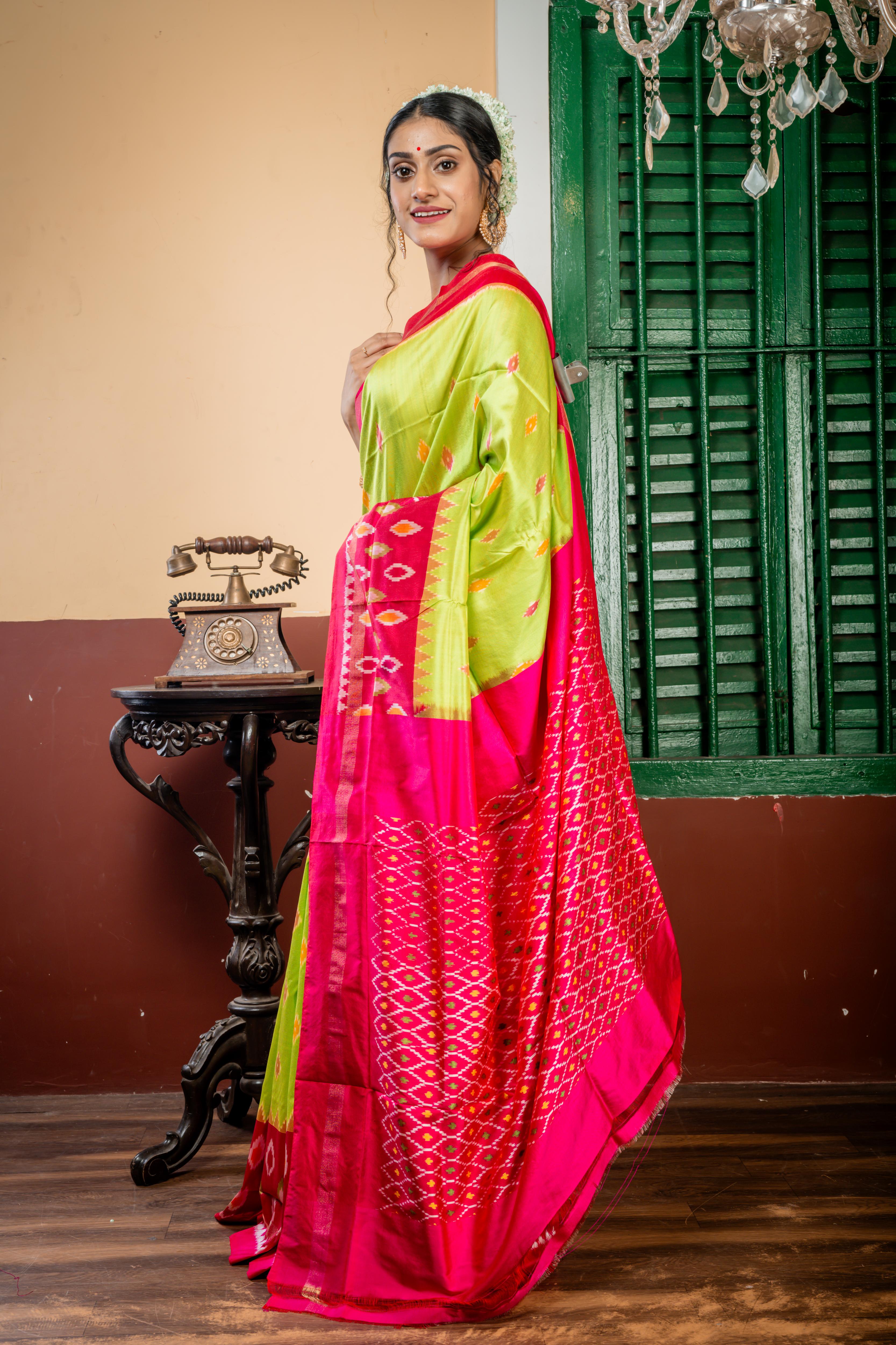 Tulasi || Parrot Green Pure Silk Ikkat Handloom Saree with all over Multi-colour traditional Ikkat Buta, Magenta & Antique Zari Border and all over Ikkat Pallu
