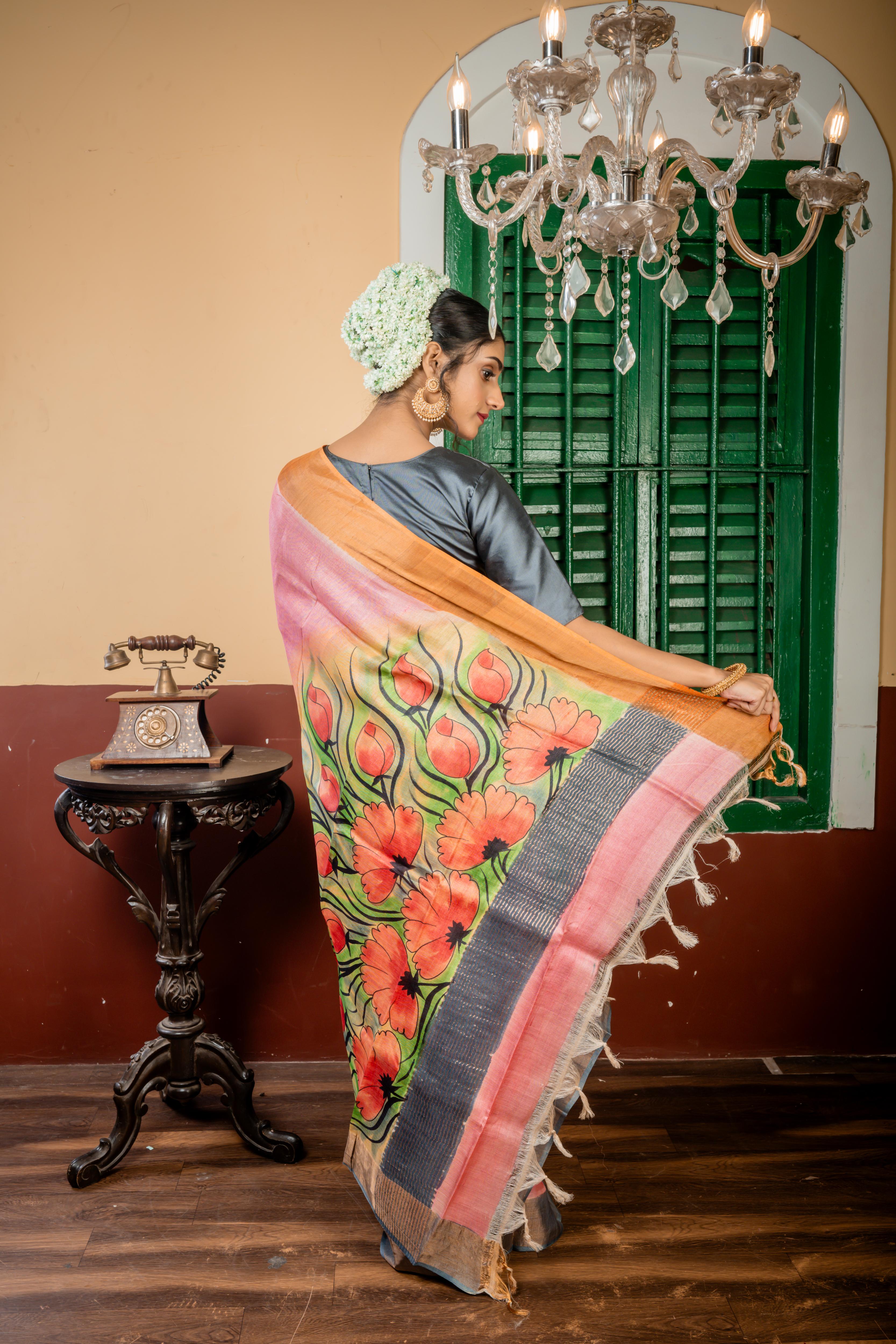 Chitrika || Light Pink & Multi-colour shaded Pure Tussar Handloom Silk Saree with Smokey Grey-Antique Gold Zari & Light Tangerine-Copper 'Ganga Jamuna' Border and Multi-colour Foral Hand Paint Body & Pallu