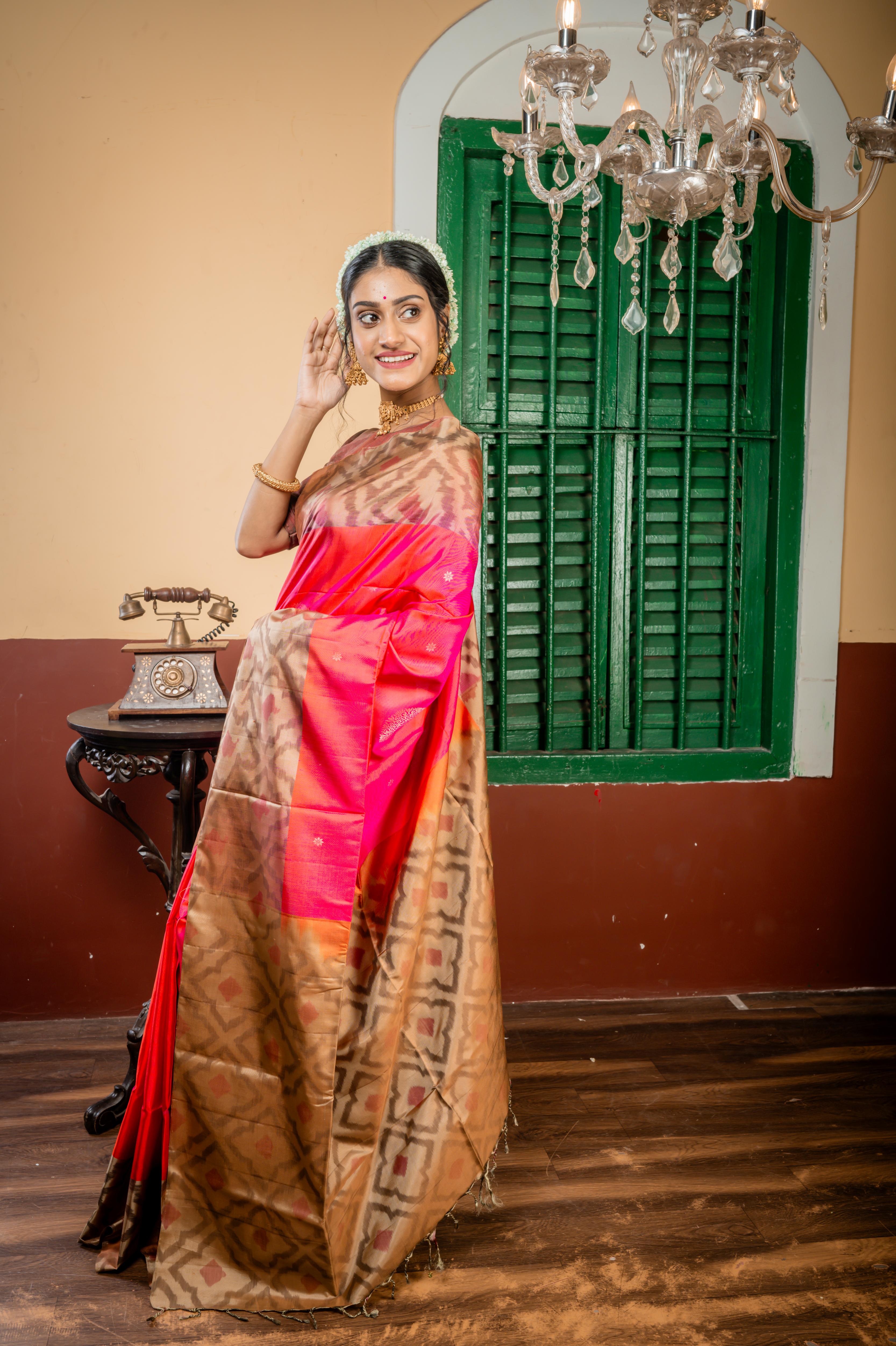 Udisha || Magenta & Rust Orange dual tone Pattu Soft Silk Handloom Saree with all over Copper Zari Buti & Buta and Peanut Brown & Antique Gold dual tone Abstract Border & Pallu