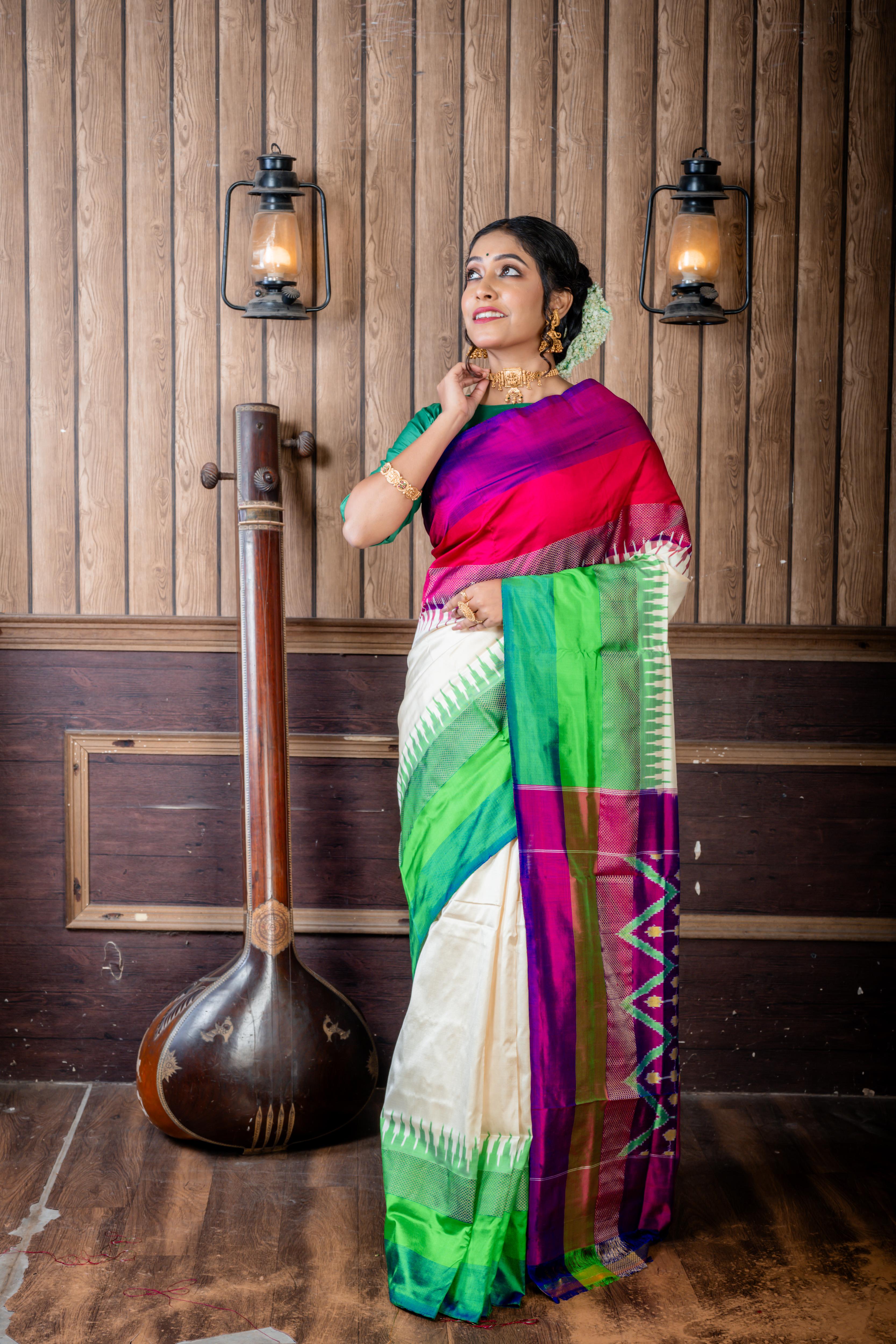 Palakshi || Off-White Pure Pochampally Silk Handloom Saree with Plain Body, Light with Dark Green & Matte Gold Zari and  Magenta with Purple & Antique Gold Zari 'Ganga-Jamuna' Temple Border; and Purple 3D Ikkat Pallu