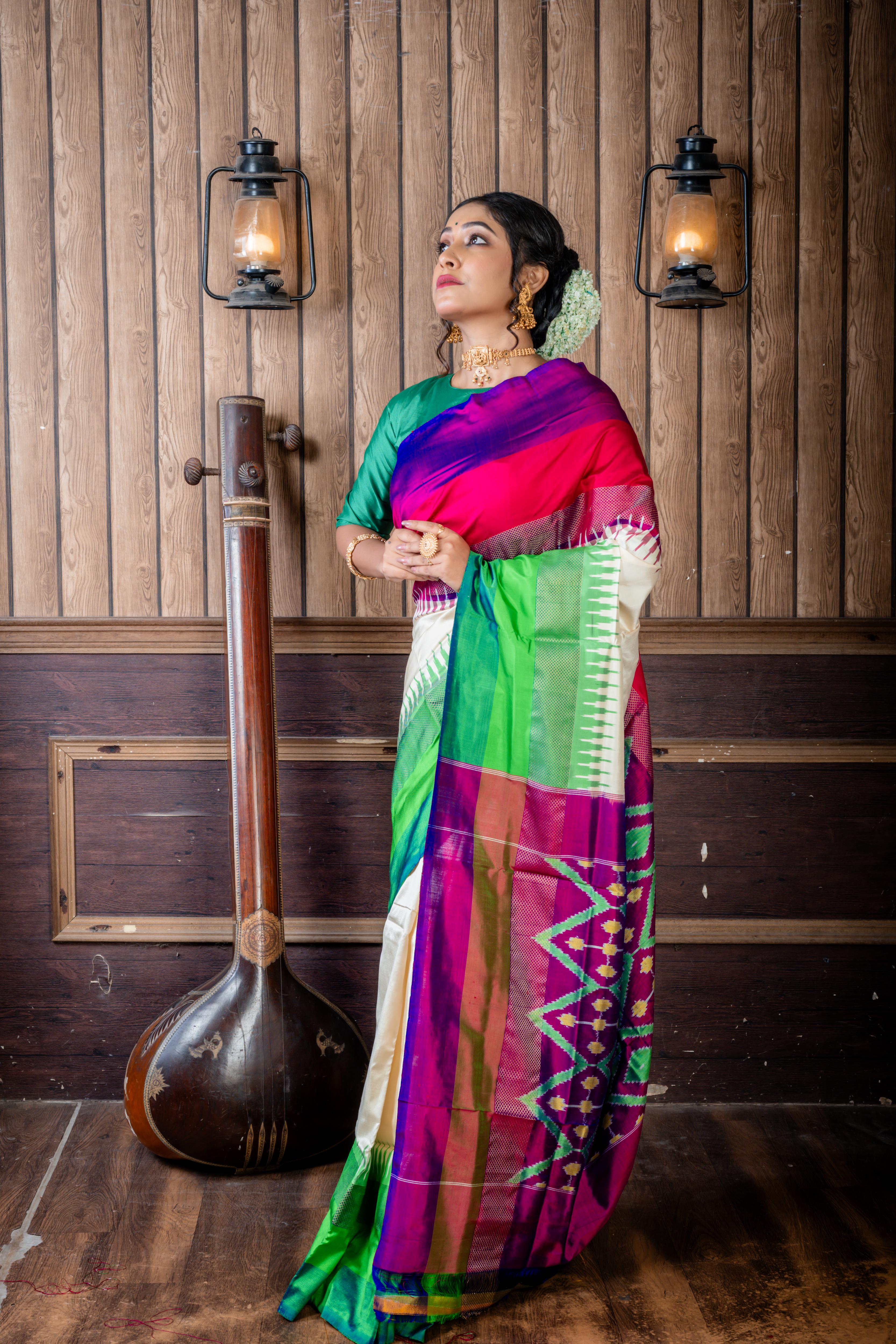 Palakshi || Off-White Pure Pochampally Silk Handloom Saree with Plain Body, Light with Dark Green & Matte Gold Zari and  Magenta with Purple & Antique Gold Zari 'Ganga-Jamuna' Temple Border; and Purple 3D Ikkat Pallu