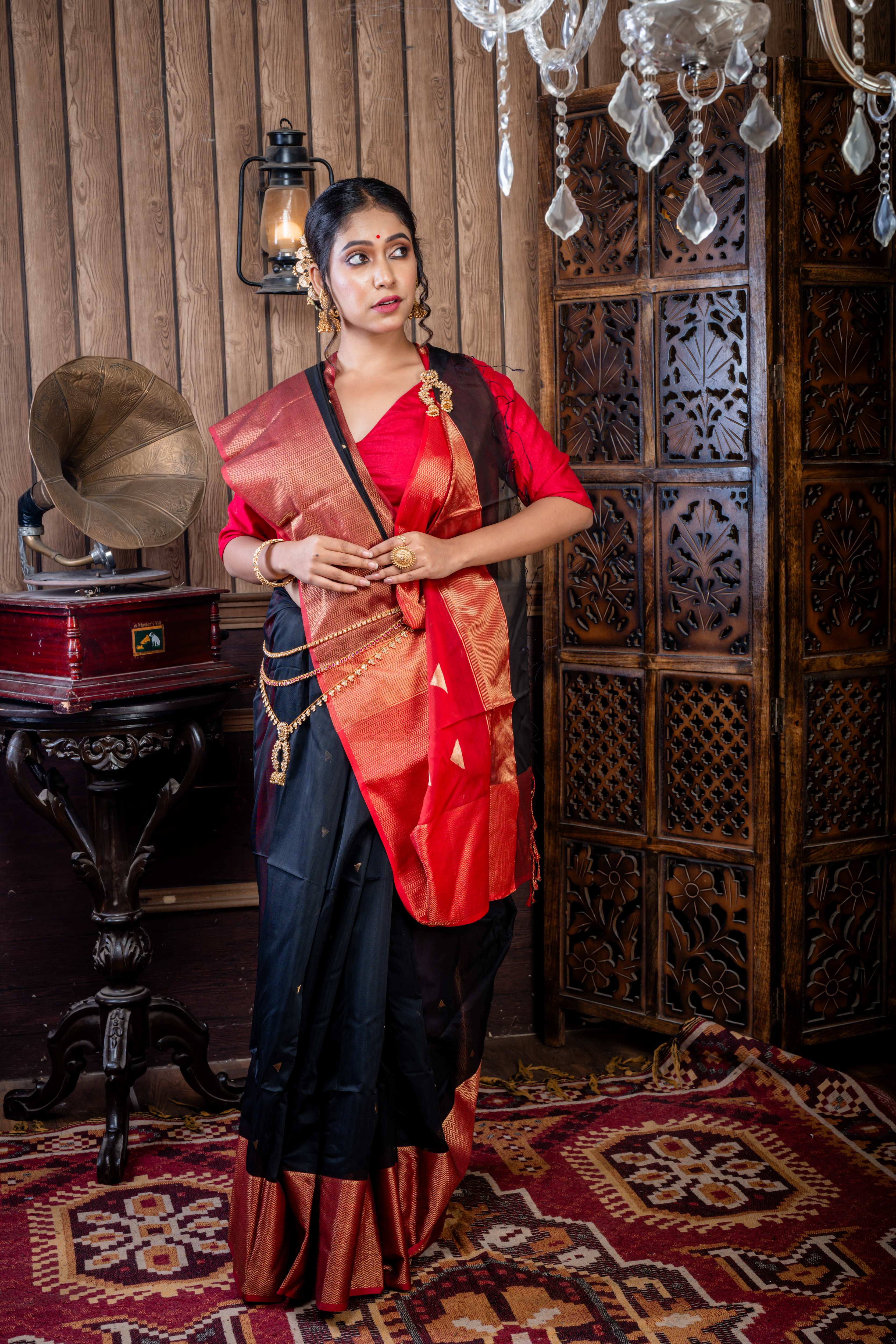 Nishita || Black Cotton Resham Maheshwari Handloom Saree with all over Antique Gold Zari Buta, Dark Garnet Red & Antique Gold Zari Brocade Border and Dark Garnet Red Pallu with Antique Gold Zari Stripe & Copper Buta